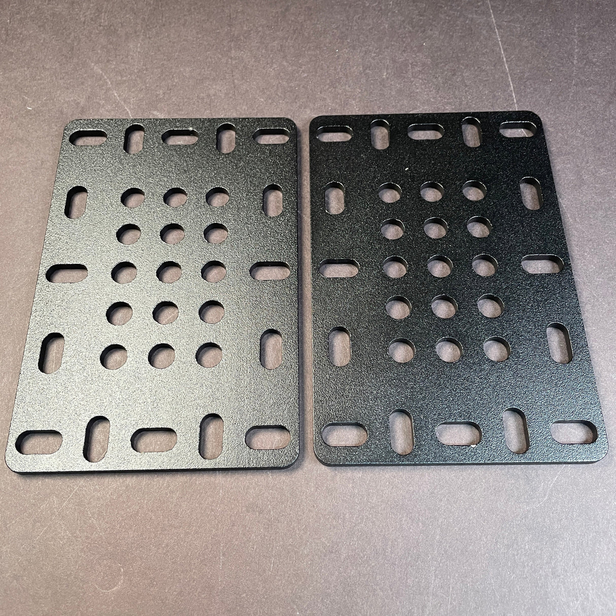 Sandtex Black universal mounting plates that are meant to be used to mount wood or epoxy resin combination table legs to your table top with ease.